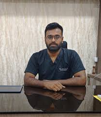 Dr Vivek M